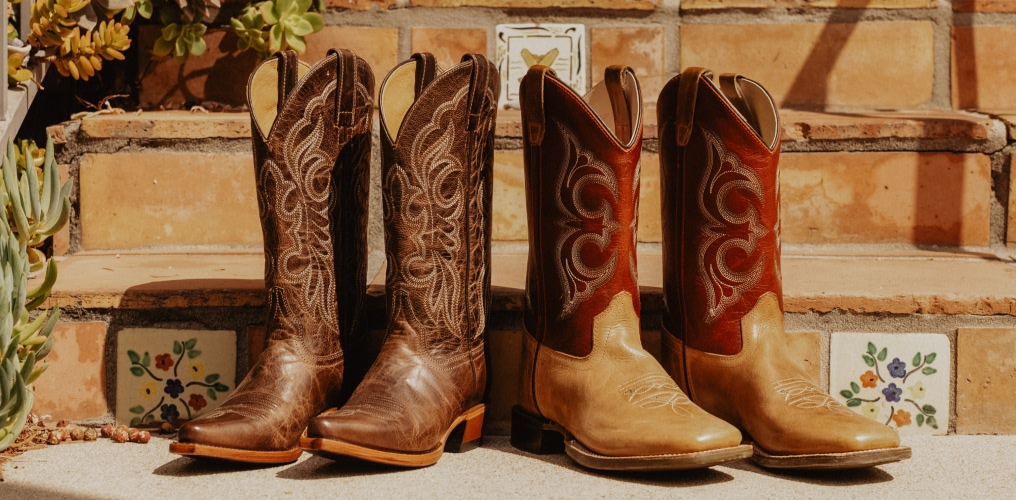 brown mens and women boots.