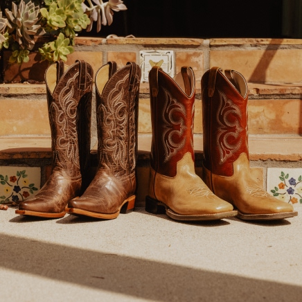 brown mens and women boots.