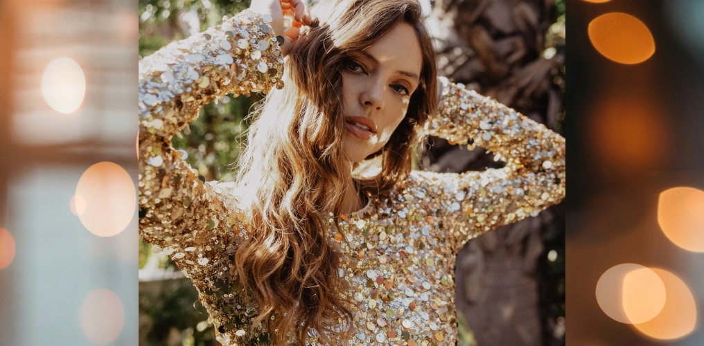 Women in gold dress.