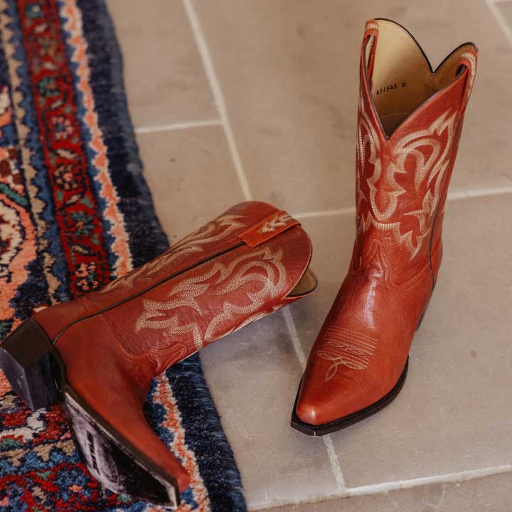 red boots on a rug