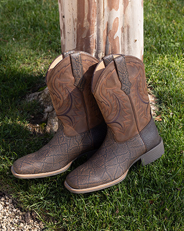A pair of boots with wood.
