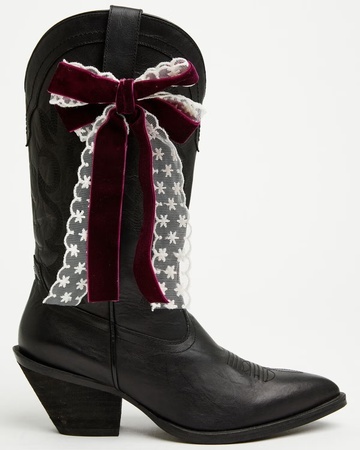 A black boot with a bow.