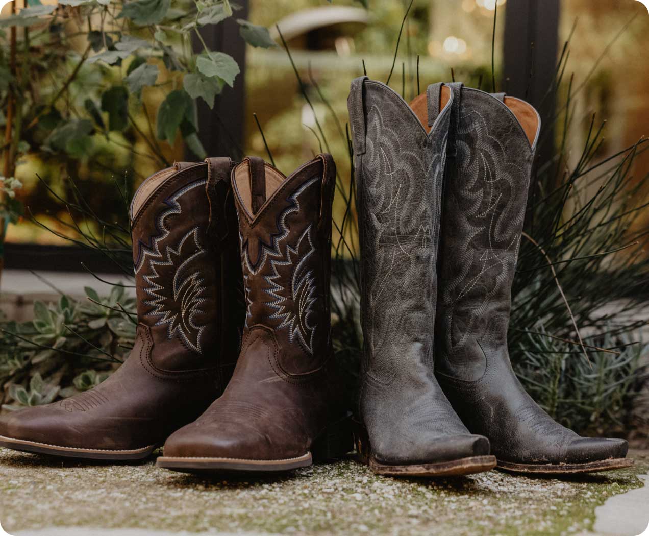 A man and woman boot with greenery
