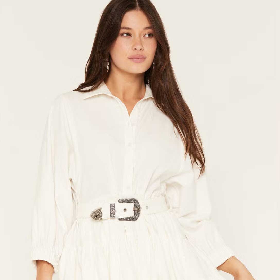 woman wearing white dress.