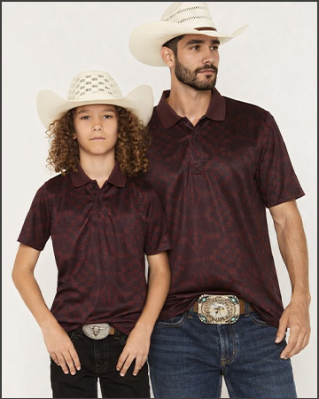man and boy in matching horse shirts.