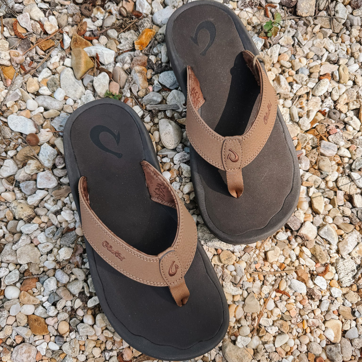 Sandals on pebbles.