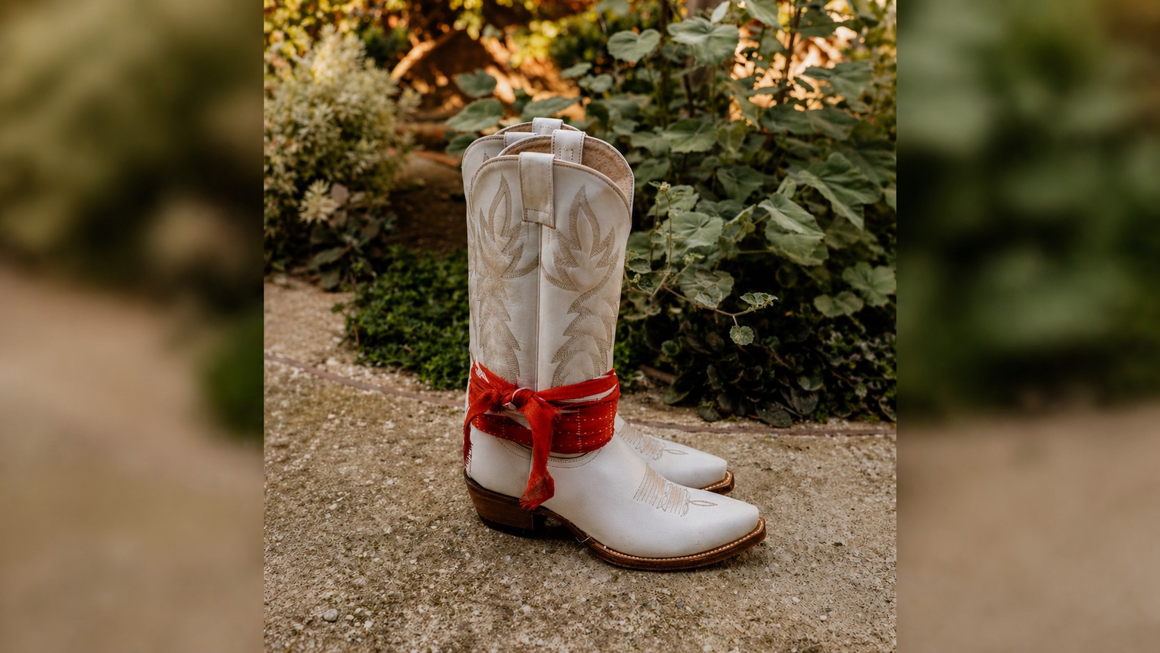 Women white boot with red bandana.